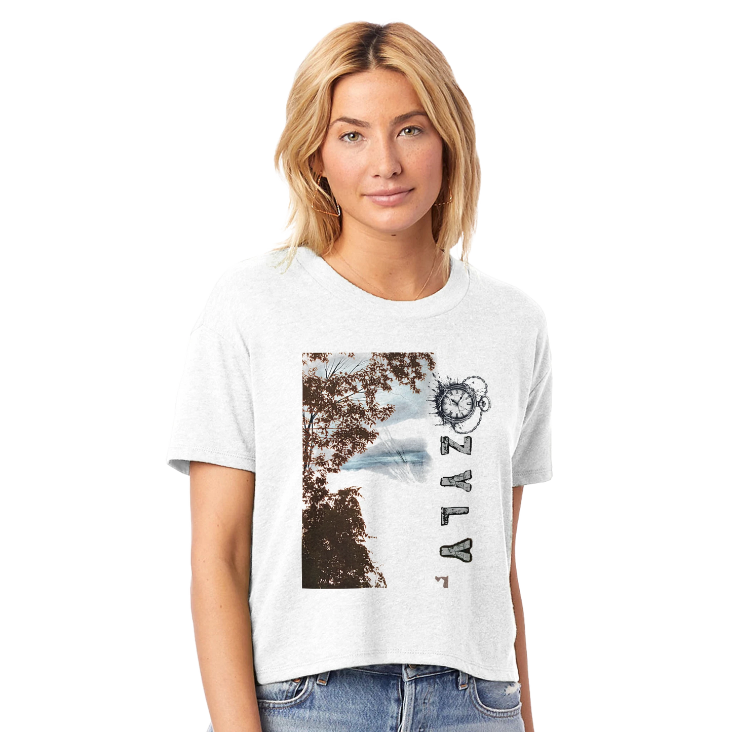 Woman wearing a white t-shirt with a tree graphic design with ''OZYLY'' and clock watch