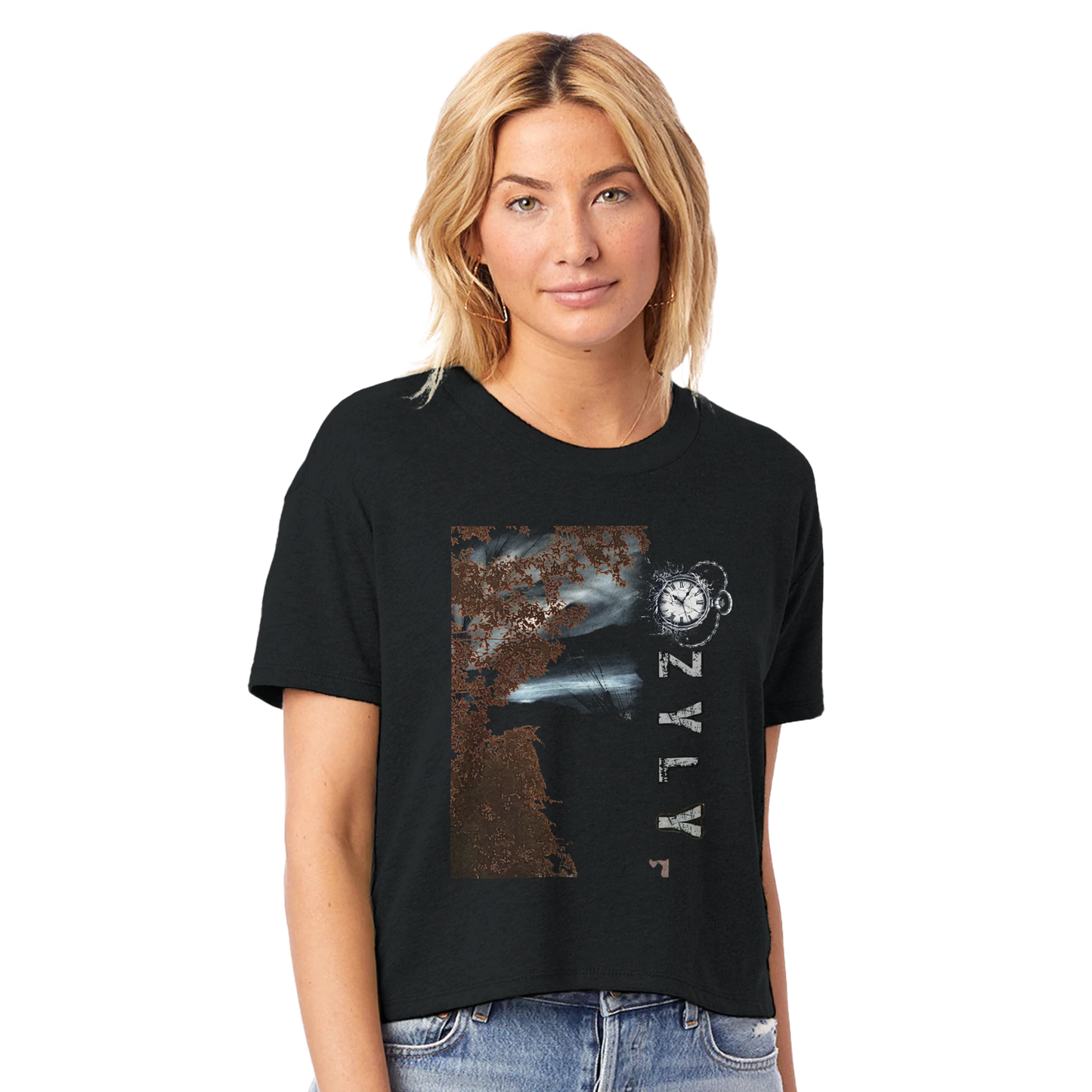 Woman wearing a black t-shirt with a tree graphic design with ''OZYLY'' and clock watch