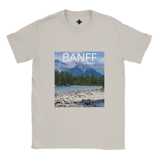 Beige t-shirt with Banff national park graphic on a white background
