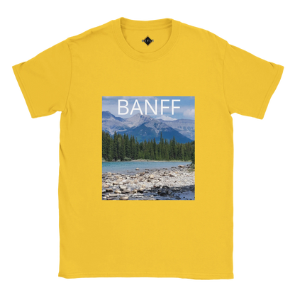 Yellow t-shirt with Banff mountain landscape graphic on a white background